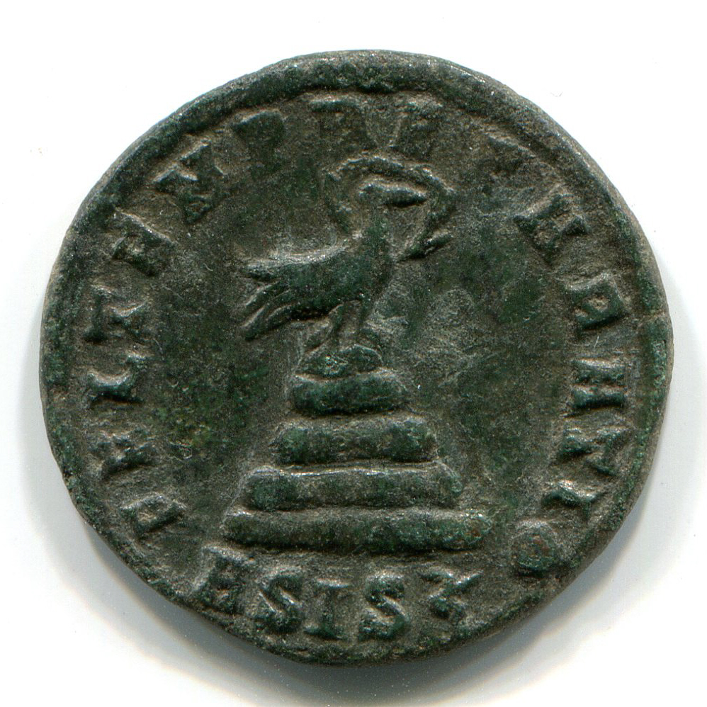 Roman coin with long-legged Phoenix with a nimbus or halo, facing right,standing on a pyre or pile of rocks - notionally twelve, with the inscription, "FEL TEMP REPARATIO", and mint mark, "ESIS". Dark green patina.
